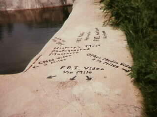 [Writing on concrete foundation points to important locations.]
